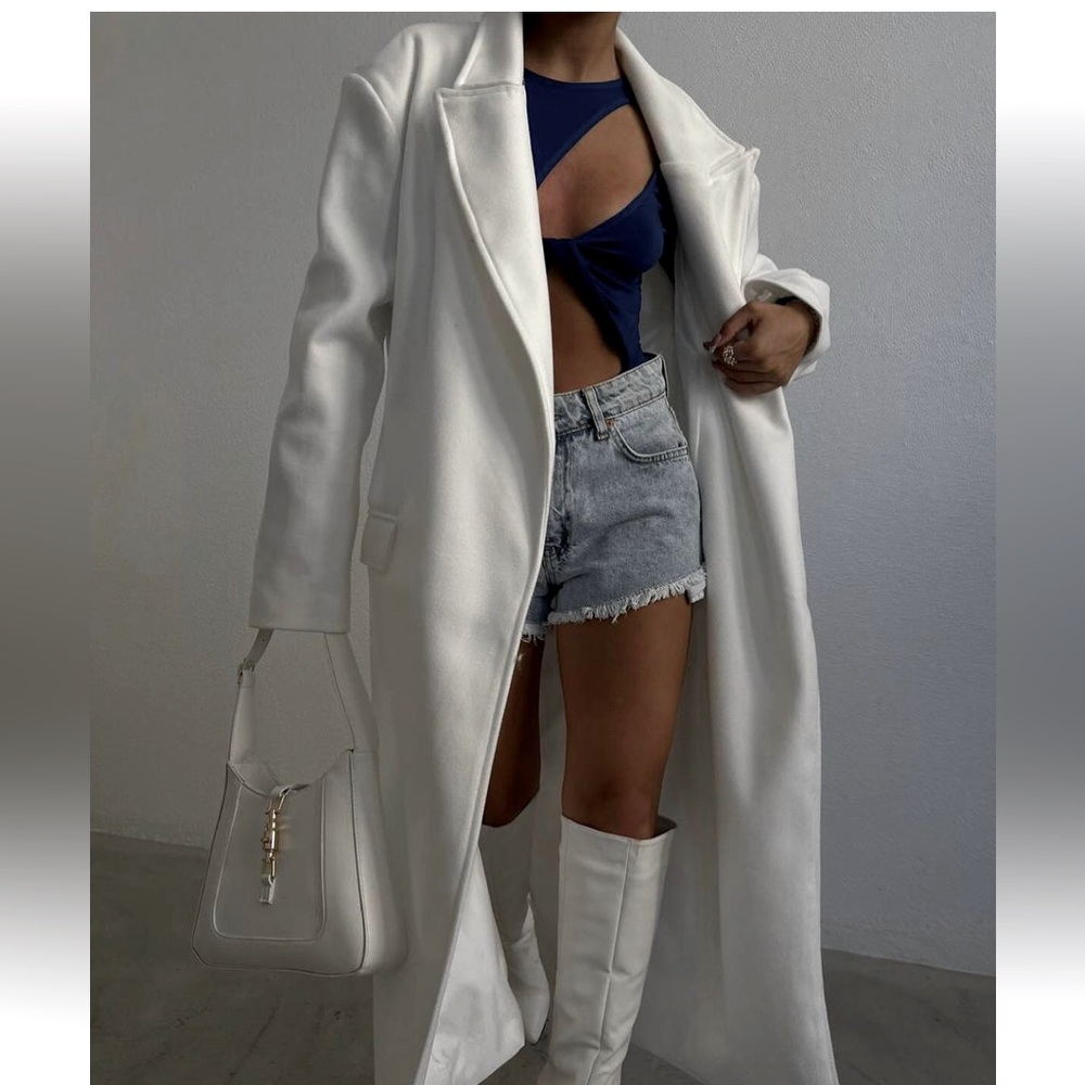 Brand new white oversozed coat.
